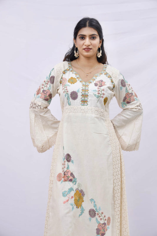 Three-piece suit consisting of a kurta (tunic), dupatta (scarf), and trousers.