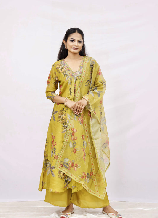 Mustard  kurta set with a dupatta.