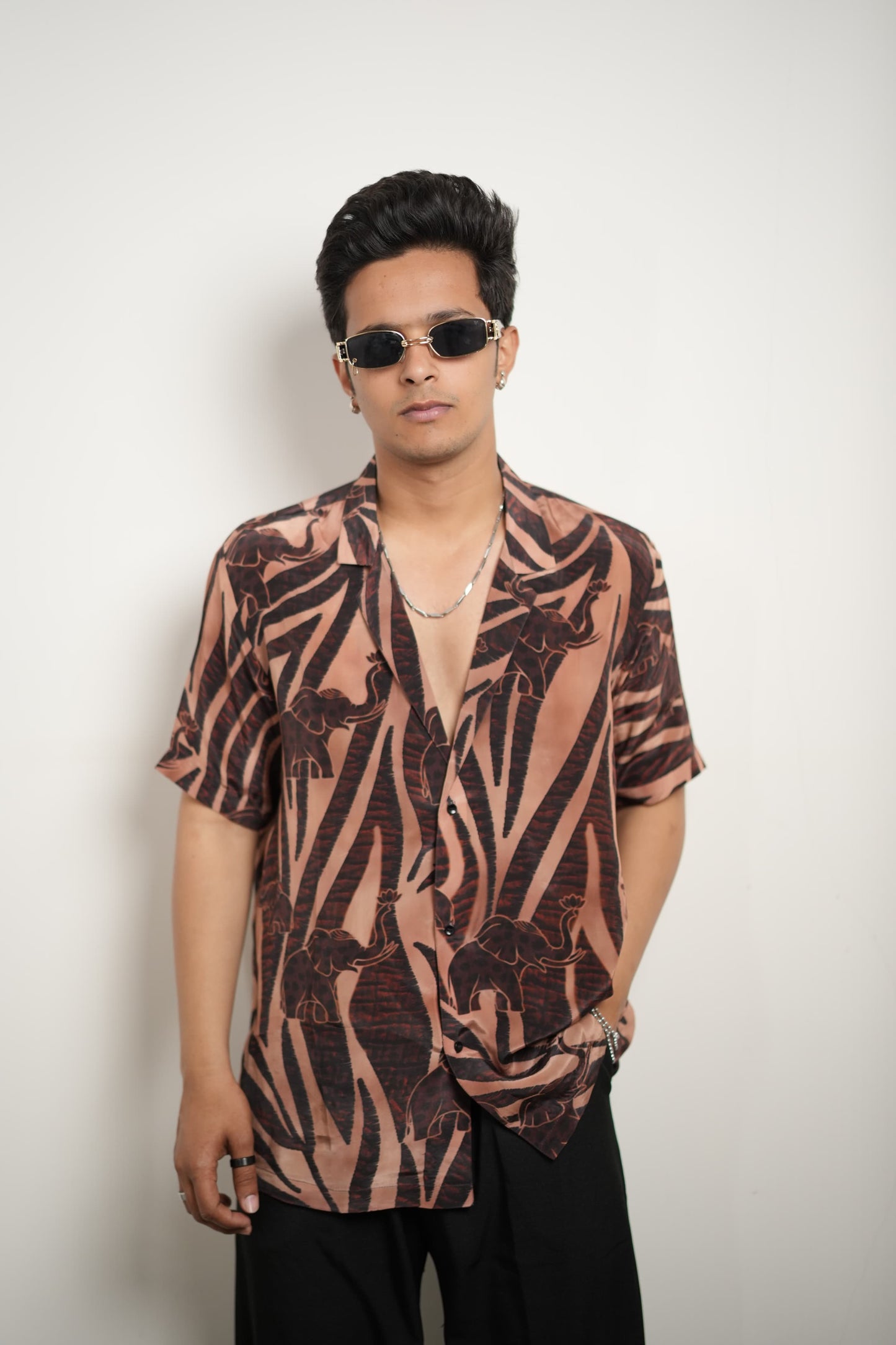 Light brown elephant print shirt