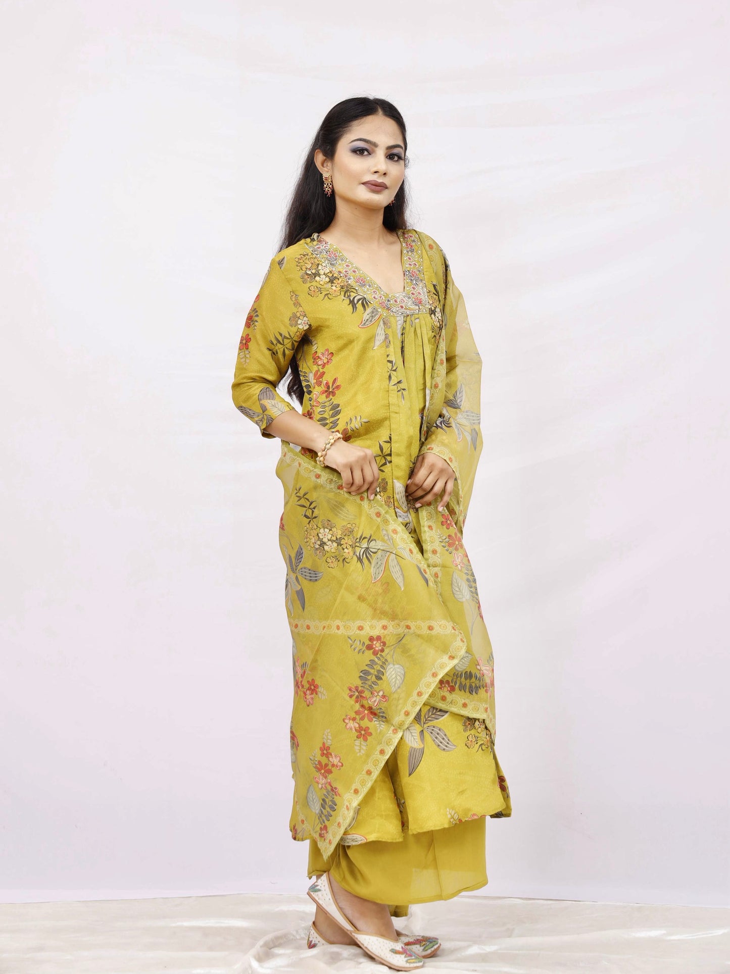 Mustard  kurta set with a dupatta.