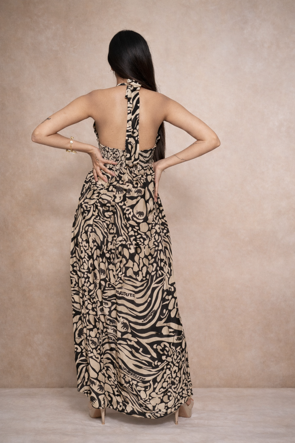 Beige black printed maxi dress for women with halter neck Rare Breed collection by Jarisuta Lifestyle