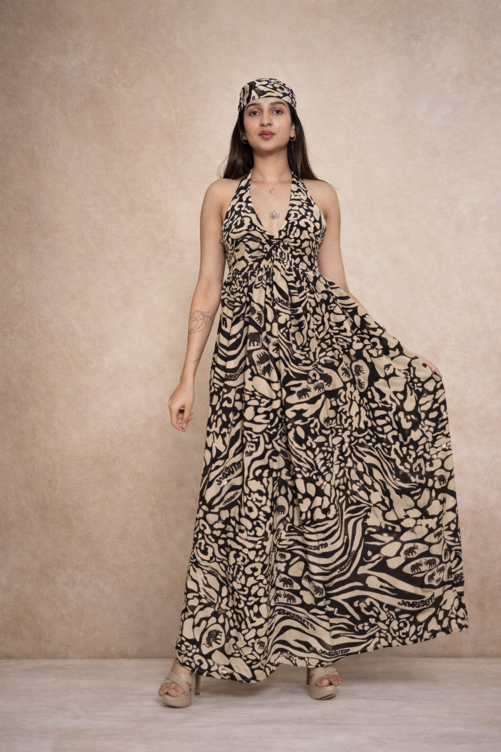 Beige black printed maxi dress for women with halter neck Rare Breed collection by Jarisuta Lifestyle