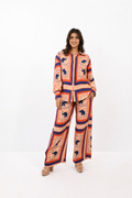 Peach printed co-ord set for women with shirt and pant statement outfit by Jarisuta Lifestyle