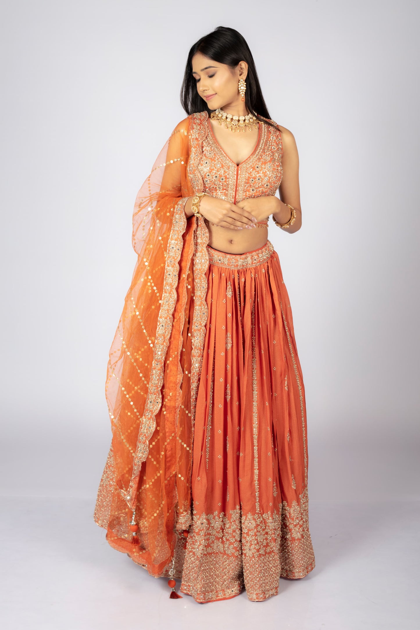 Product Title: Elegant Orange Embroidered Lehenga Choli Set