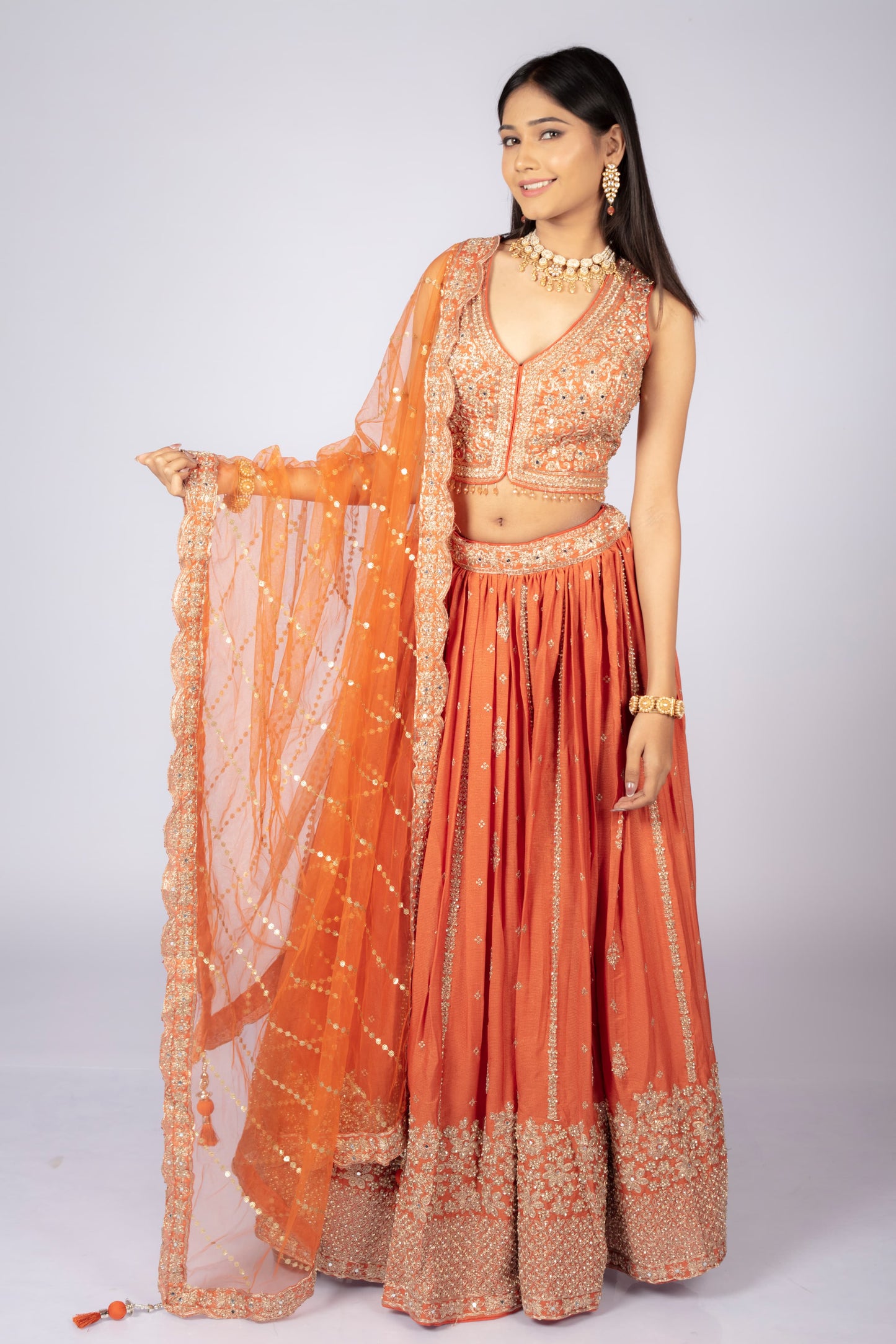 Product Title: Elegant Orange Embroidered Lehenga Choli Set